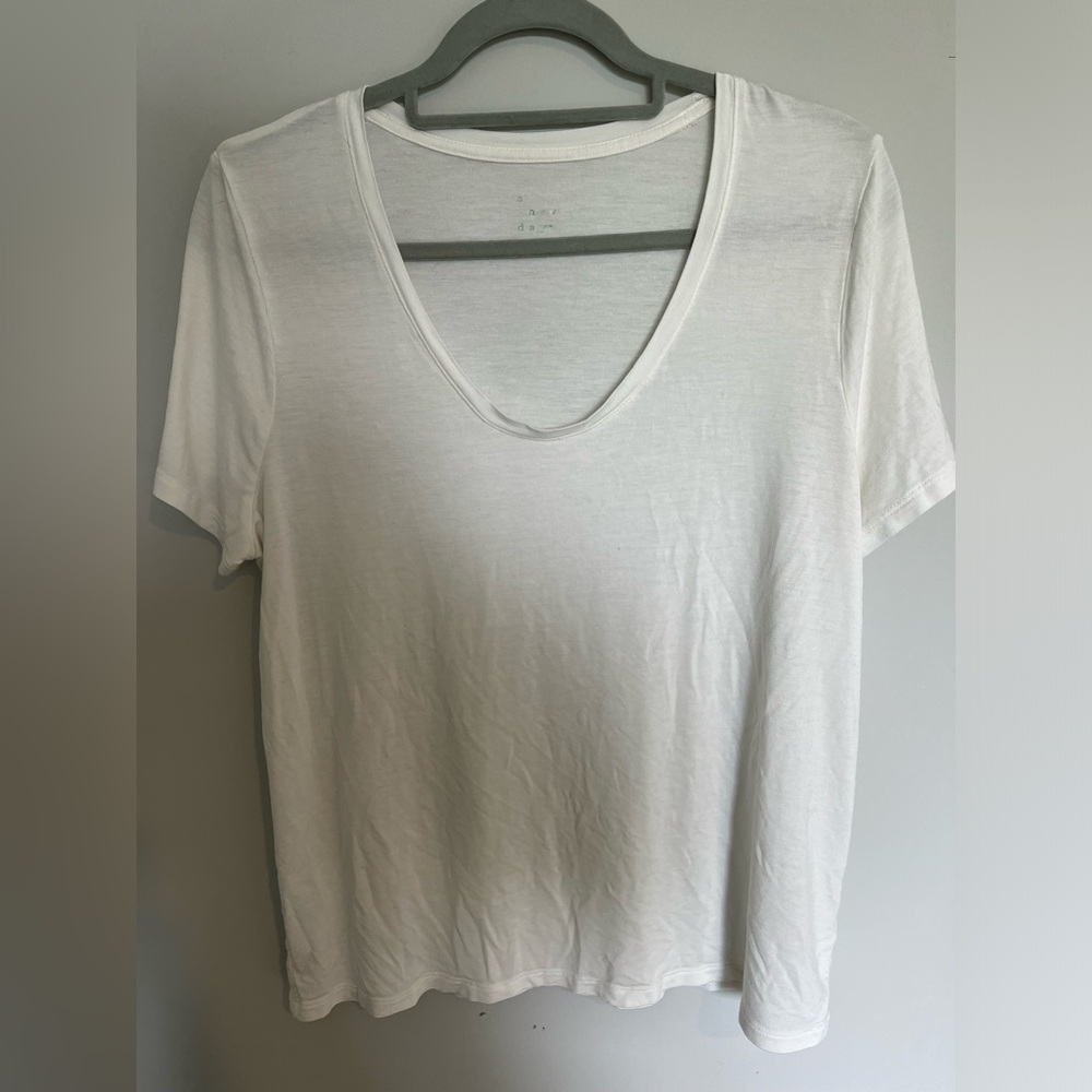 a new day white t shirt